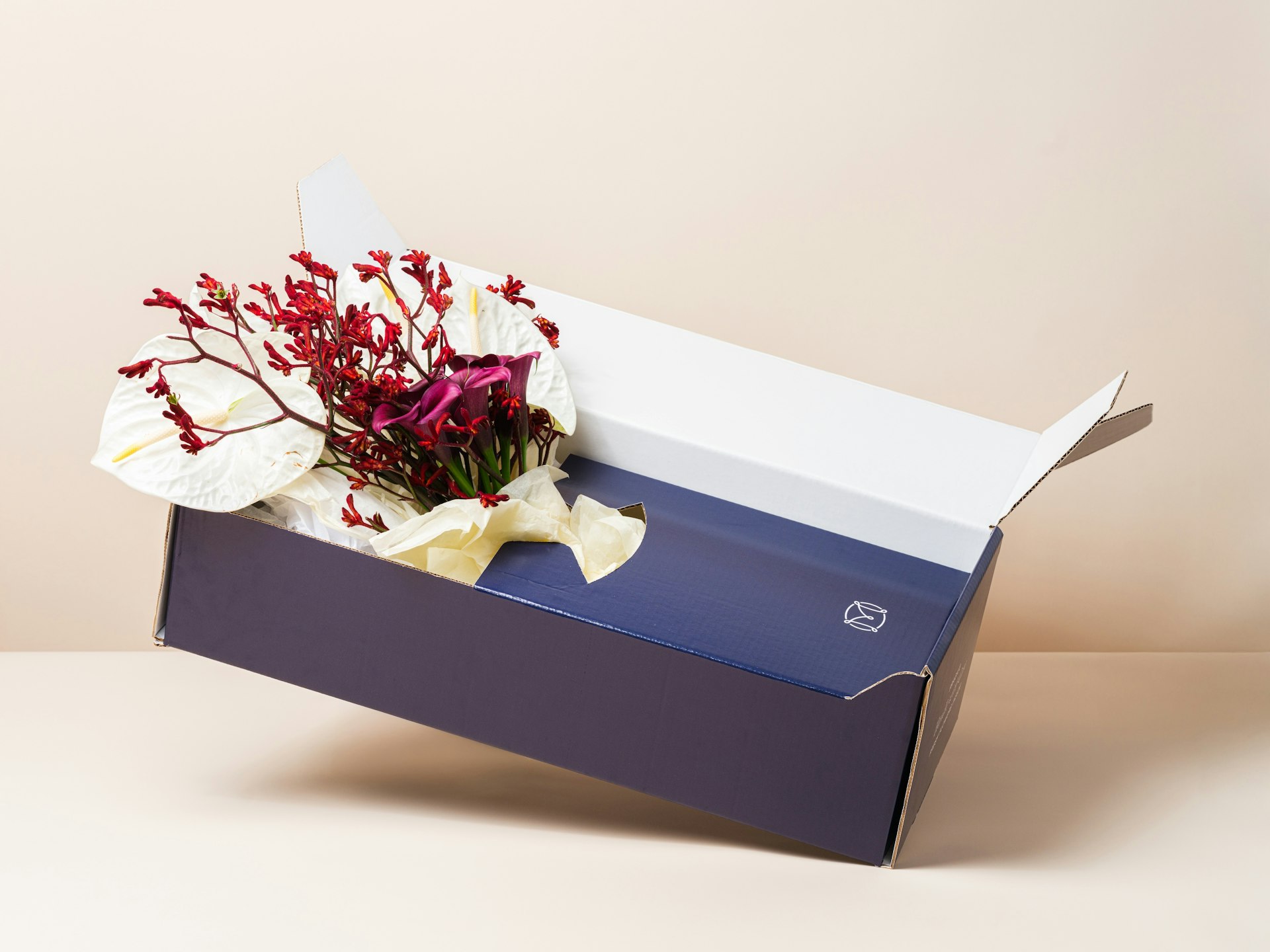 Retrospect by MERIT in a black vase