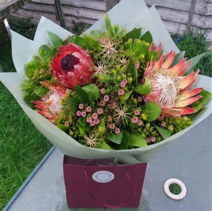 King Protea bouquet by Iridescent Florals — flowers available for delivery from Floom