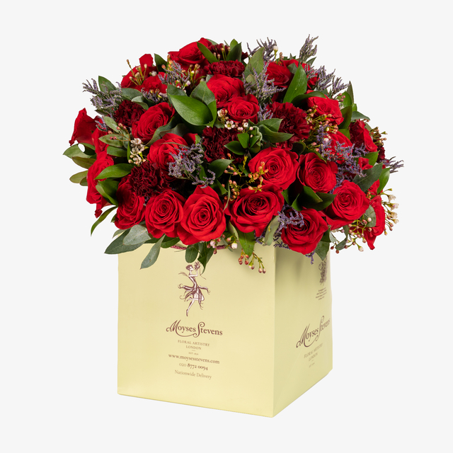 Symphony in Red by Moyses Stevens Flowers — flowers available for delivery from Floom