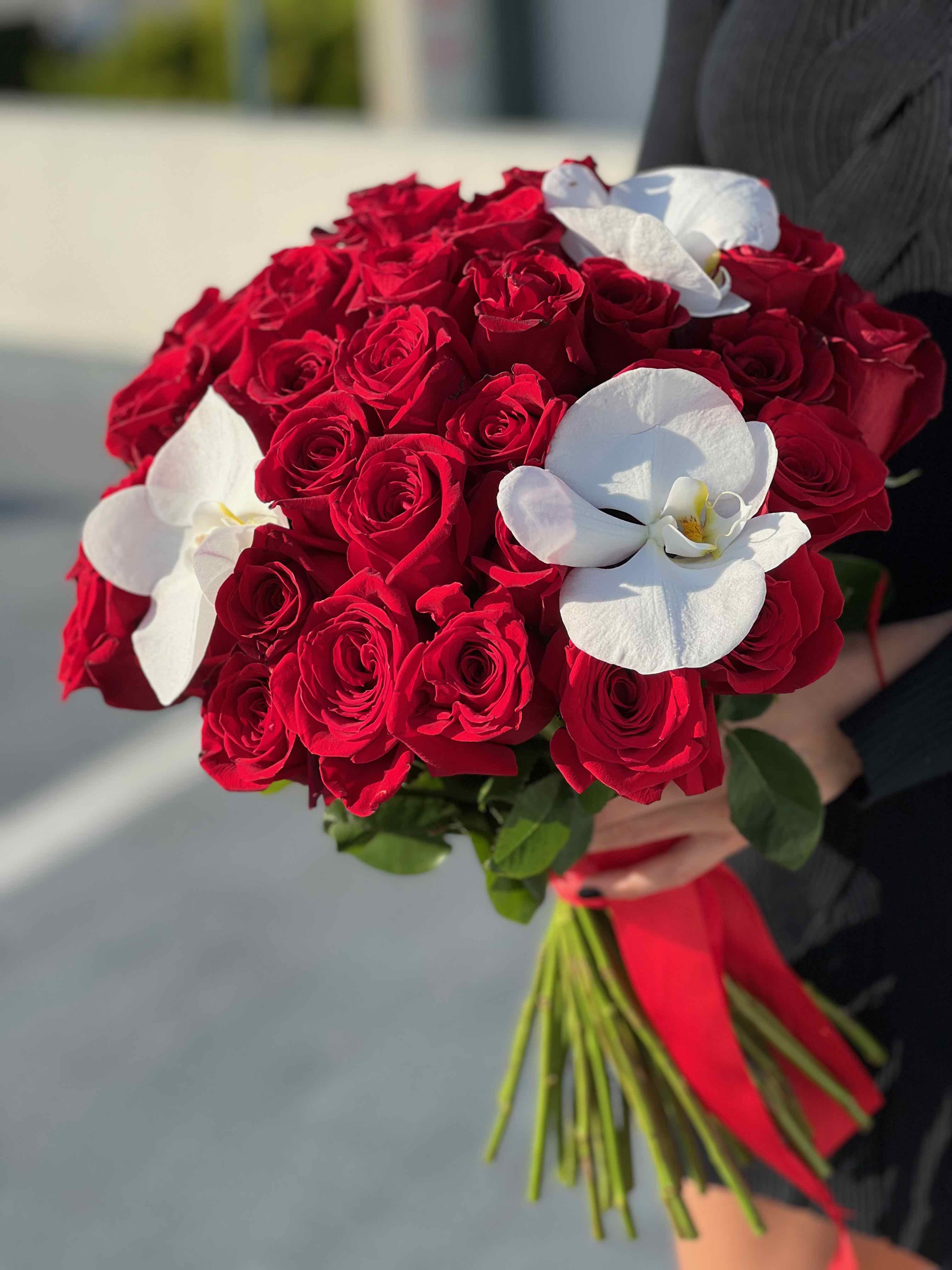 Red roses and orchids