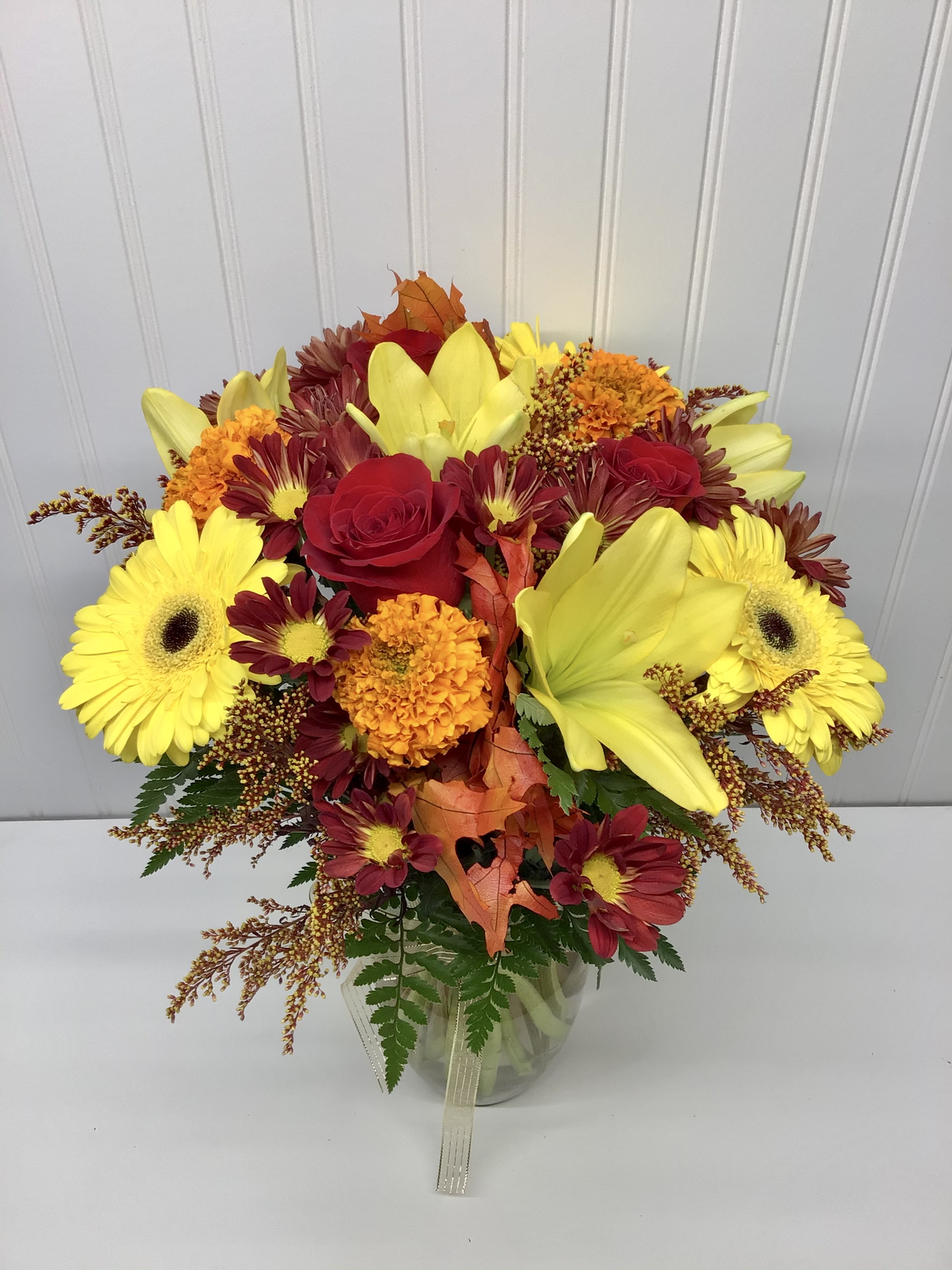 Autumnal feel by Lovely Blooms Decorations Corp — flowers available for delivery from Floom
