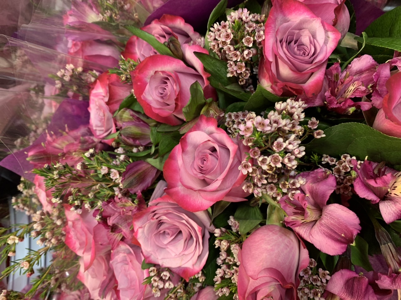 Roses and wax flowers