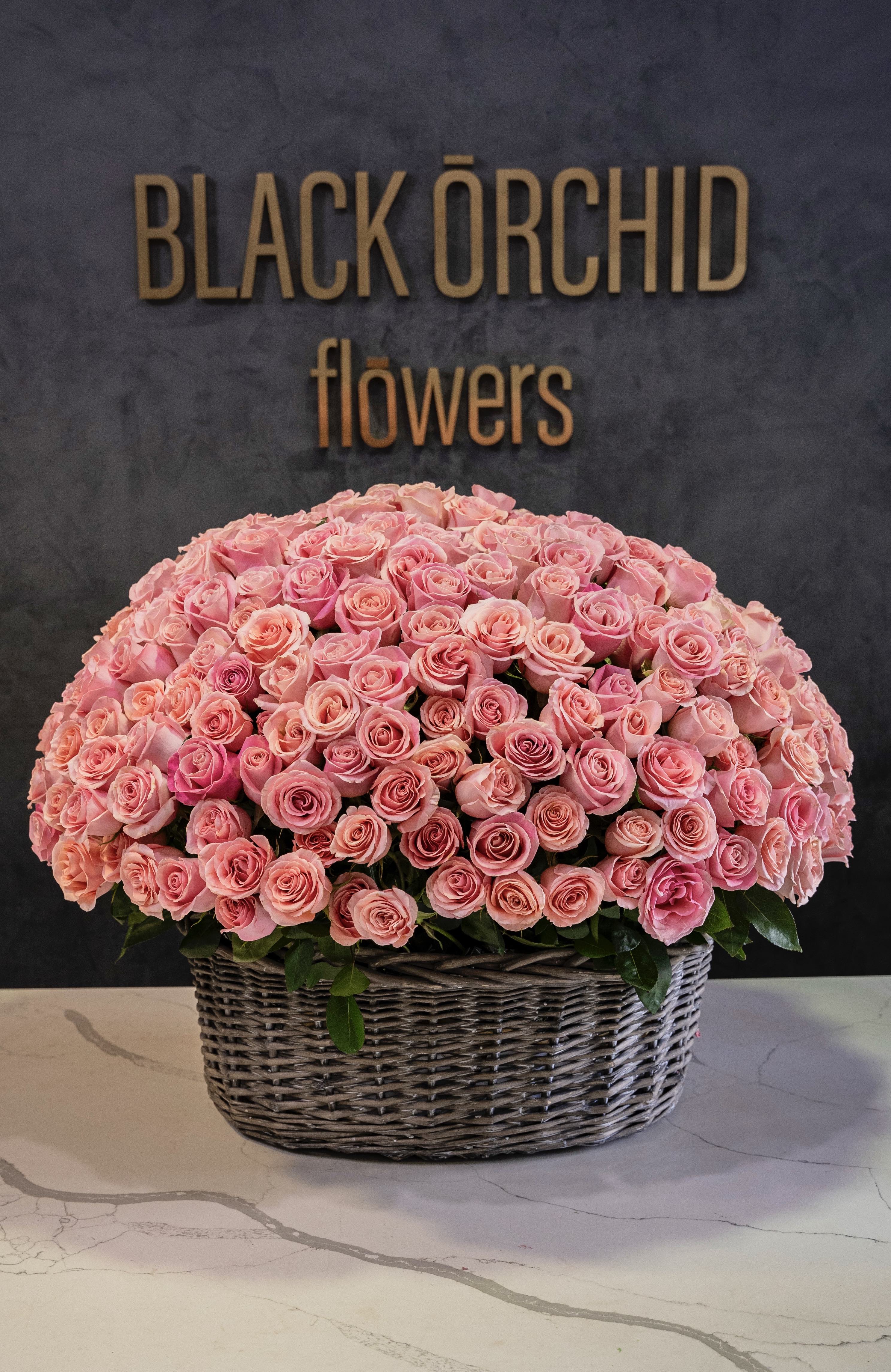 300 pink roses basket