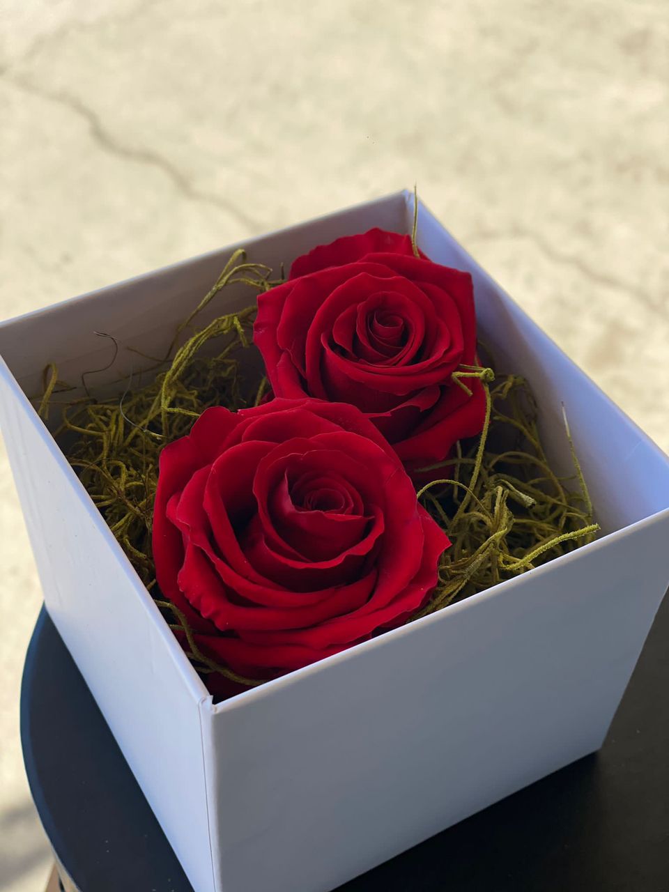 Double roses in box