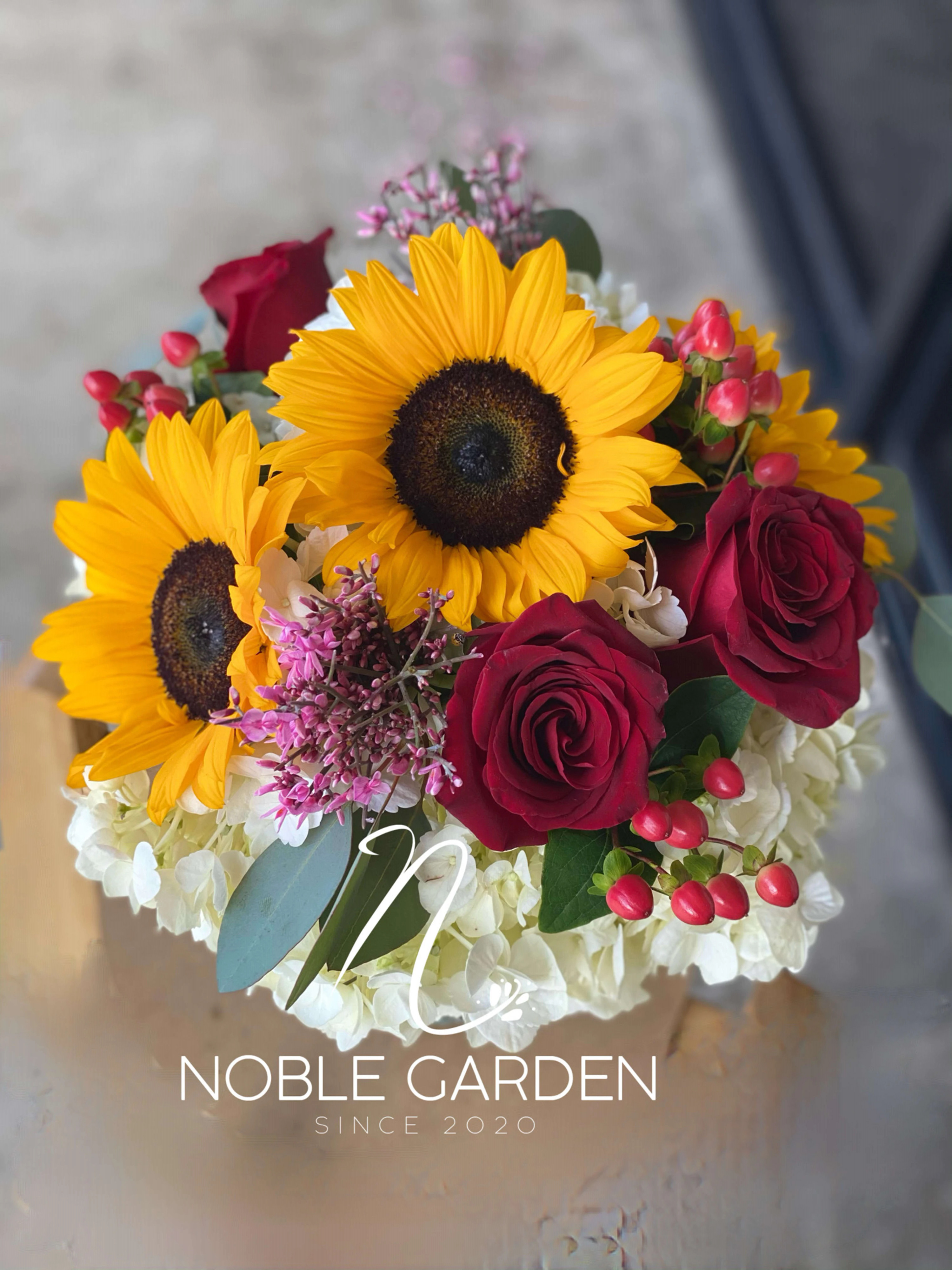 Sunflowers and roses